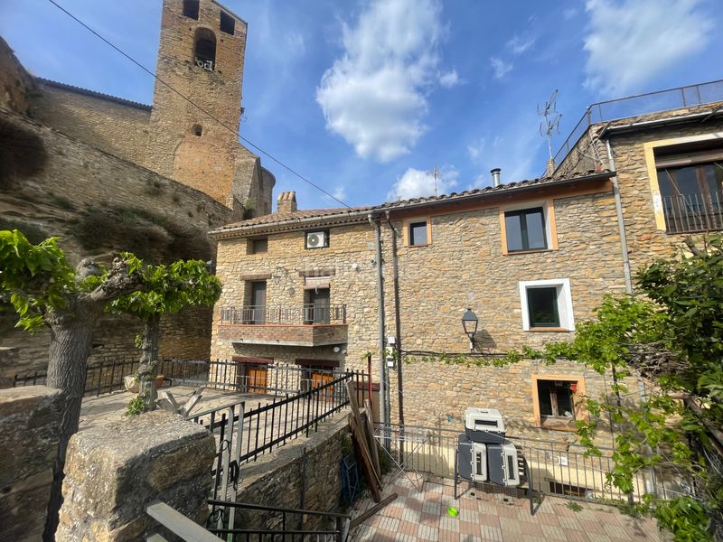 Foto 8f6145b1-d126-410d-ae56-2b28ce08c879. Casa adossada a carrer del marquès 6 a Àger