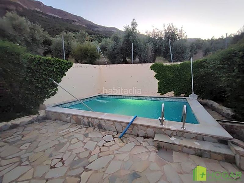 Foto 2439ca51-ae45-423e-90c5-05a36bf55459. Casa aparellada amb piscina a Jabalcuz Jaén