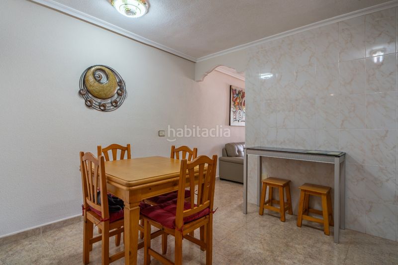 Foto 63c73907-f27e-4019-adab-788516947ec2. Casa adosada este elegante duacuteplex en la Torre de la Horadada, ubicado junto a la playa de rocamar y a escasa distancia de la playa de las en Pilar de la Horadada