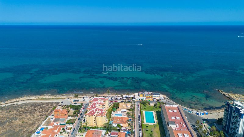 Foto ba6f89f6-b920-4cdc-b531-a6c760f8175b. Casa amb calefacció a Punta Prima Torrevieja