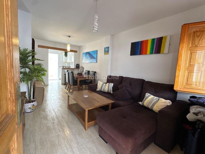 Foto 78c4f309-376f-4b5b-afc3-d98d6cb60e78. Casa adossada amb piscina a Pueblo Latino Pilar de la Horadada