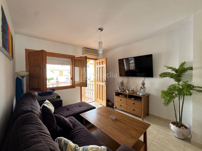 Foto 7e0ea512-f637-4573-af6f-c8b9bc955701. Casa adossada amb piscina a Pueblo Latino Pilar de la Horadada