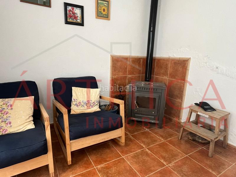 Foto 3ceb433c-dec6-428b-a7a2-594745fdb2b1. Casa adossada amb xemeneia aparcament a Valle de Abdalajís