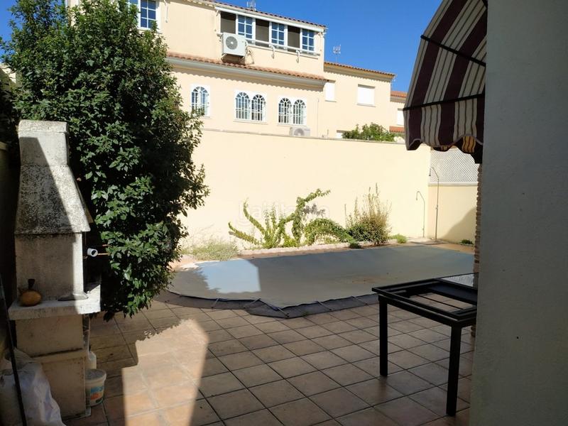 Foto d1860af9-d0d7-4ece-ad6c-ef80b94c1006. Casa a schiera con riscaldamento parcheggio piscina in Plasencia