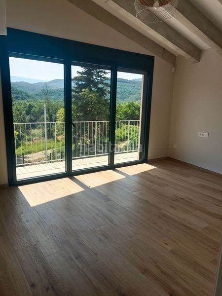 Foto 83c21e3d-e592-4dbf-b34f-6a3d3dedd663. Location maison avec chauffage parking dans Sant Aniol de Finestres