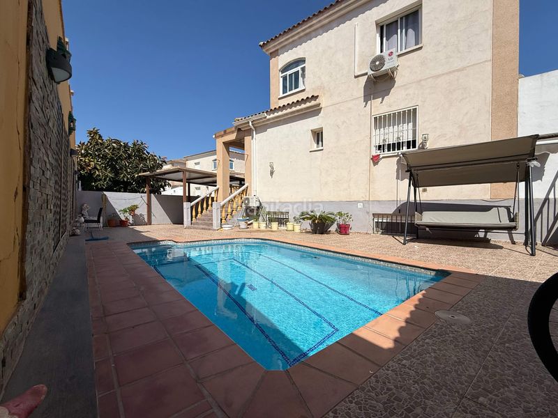 Foto 3bf94885-8123-4ca7-843b-97f68db25128. Casa aparellada amb calefacció aparcament piscina a Nucia (la)