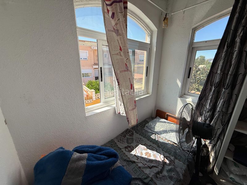 Foto 4a63e844-7bfc-46f8-8b31-d651c0e0a81b. Casa aparellada amb calefacció aparcament piscina a Nucia (la)