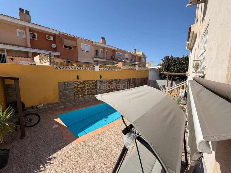 Foto 625254e3-019b-4b06-909b-70dcad638e9e. Casa aparellada amb calefacció aparcament piscina a Nucia (la)