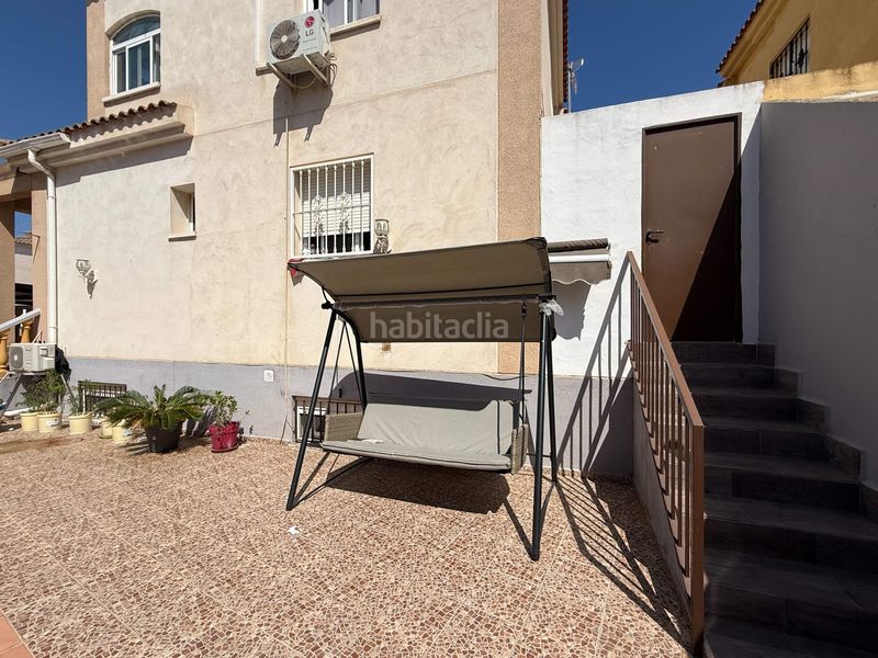 Foto 71ac7735-a643-465e-bbbf-421bca9e46a4. Casa aparellada amb calefacció aparcament piscina a Nucia (la)