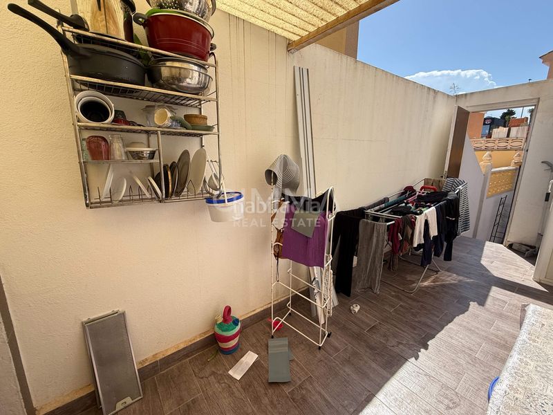 Foto bc6d7352-2503-4c28-a8c4-fe56af163a92. Casa aparellada amb calefacció aparcament piscina a Nucia (la)