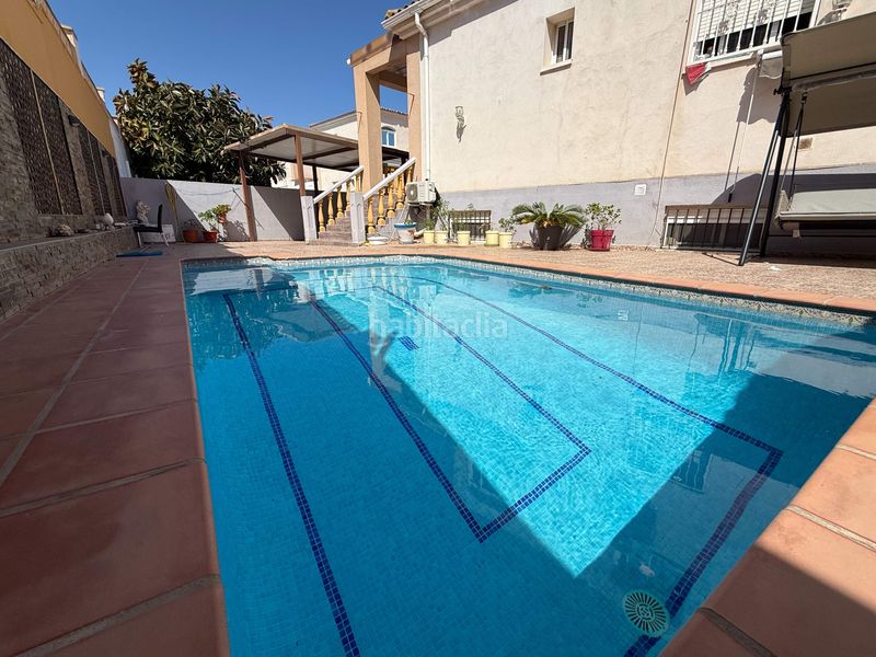 Foto fb334585-7a27-4693-bae4-e38d5adbee0a. Casa aparellada amb calefacció aparcament piscina a Nucia (la)
