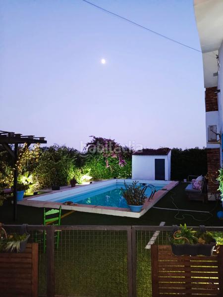 Foto e168f83a-f4e2-4276-adea-f32e1f18df3e. Xalet amb xemeneia piscina a Loreto Espartinas