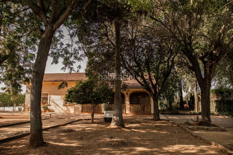 Foto f3ccc546-09eb-4386-be5e-dc25ba5bd8ab. Xalet amb xemeneia piscina a Loreto Espartinas