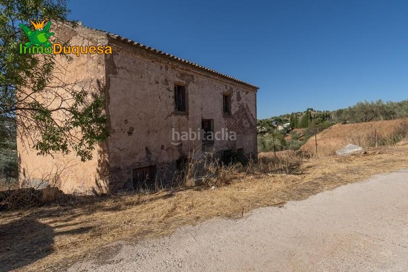 Foto eea855eb-6625-4fc5-86c6-9b95f0f7668f. Masía terreno rústico con cortijo en cogollos vega en Cogollos de la Vega