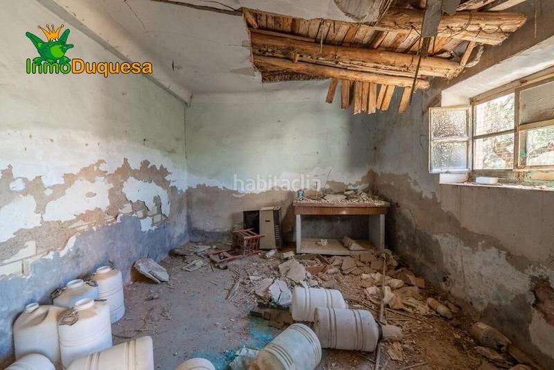 Foto ff3f6274-33fd-4ce1-a5f7-d7718376c6f7. Masía terreno rústico con cortijo en cogollos vega en Cogollos de la Vega