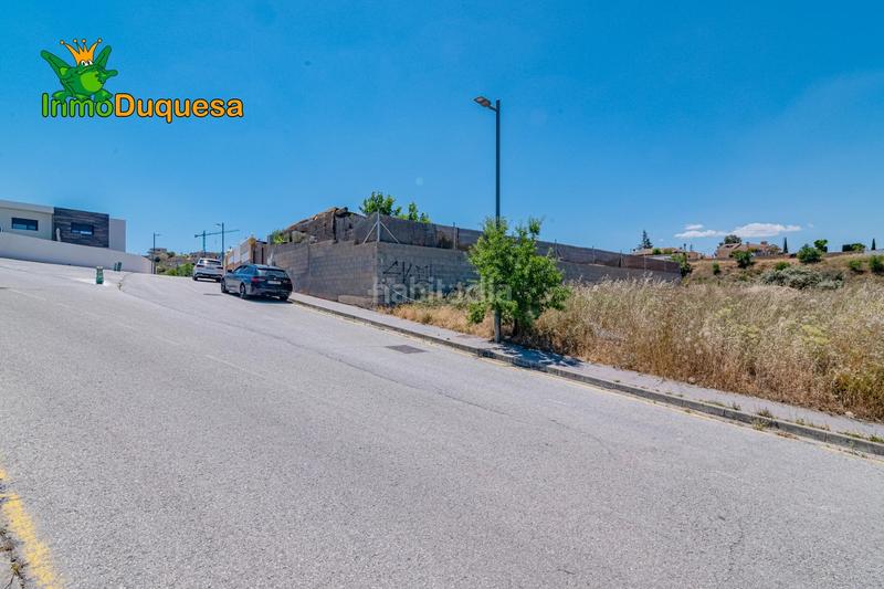 Foto c185b2e7-db17-4463-8420-452908cb439e. Terreno residencial solar urbano en la zubia. con vistas despejadas en Zubia (La)