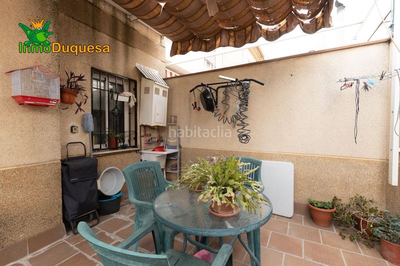 Foto cd4e5912-c54d-439d-a27e-f55bee290777. Casa aparellada amb aparcament a Atarfe