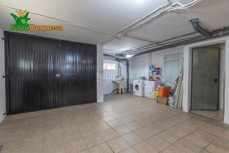 Foto fc0c3d3e-804e-4ec0-a05a-4fc7385292bf. Casa aparellada amb aparcament a Atarfe