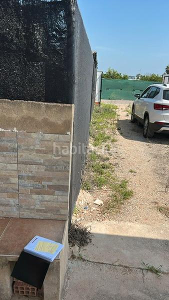 Foto 705560a4-6558-4361-a0e5-c7bbd2fd0531. Fondo rustico in polígono número 40 299 in Sueca Sueca