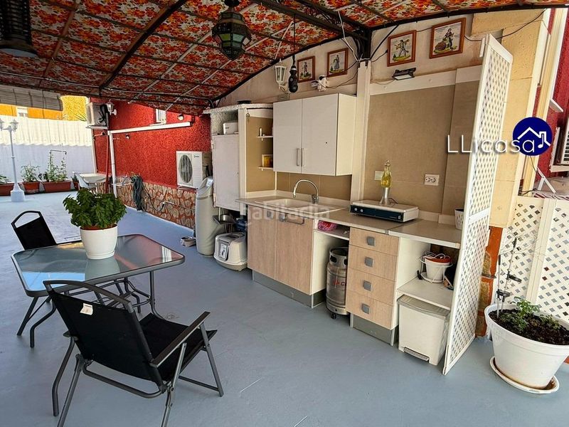 Foto a1b79908-bc0d-4d39-a262-d4c9d5f34868. Casa aparellada amb aparcament piscina a La Conarda Pobla de Vallbona (la)