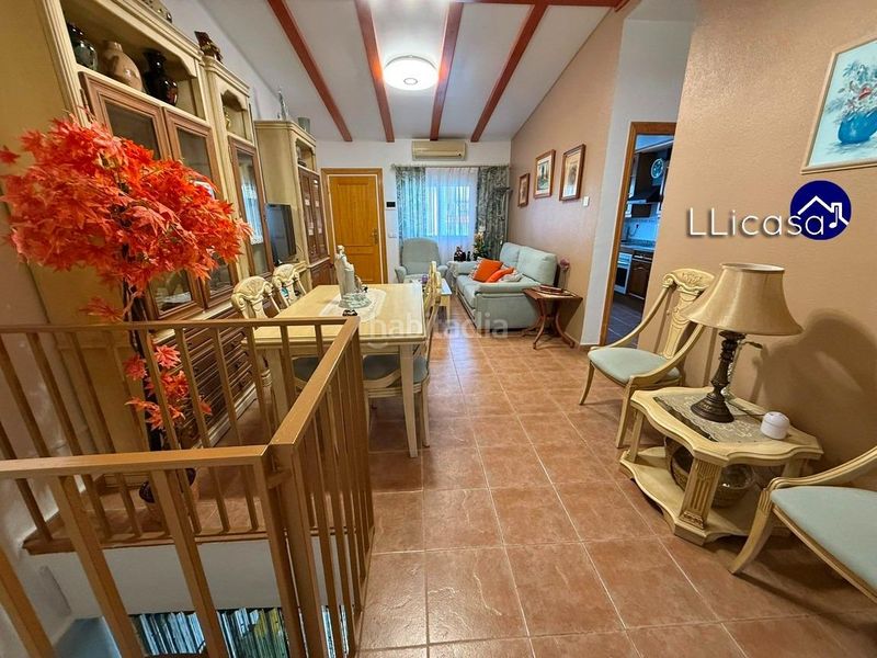 Foto c410671c-4535-45a6-b025-8fe3983a6bec. Casa aparellada amb aparcament piscina a La Conarda Pobla de Vallbona (la)