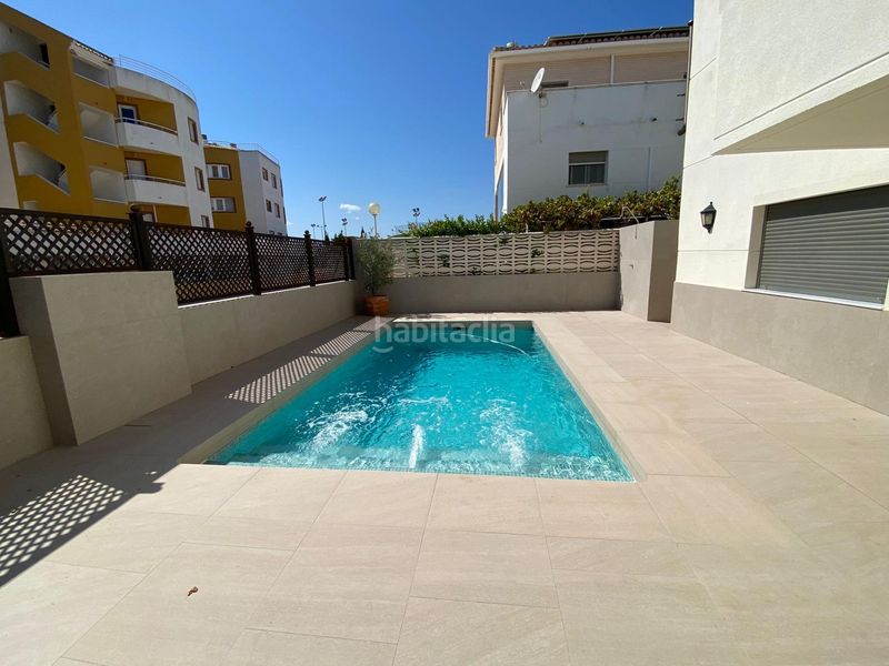 Foto a30d1b64-0ebf-4c2d-9b44-0607f6bf2718. Casa adossada amb calefacció piscina a Oliva nova Oliva