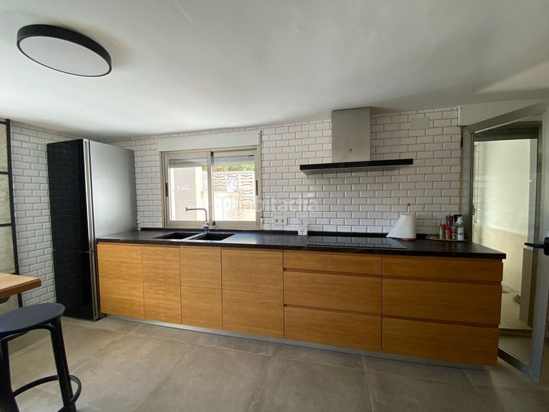 Foto ce3e1da1-22bd-469e-8e70-df3471bb79ab. Casa adossada amb calefacció piscina a Oliva nova Oliva