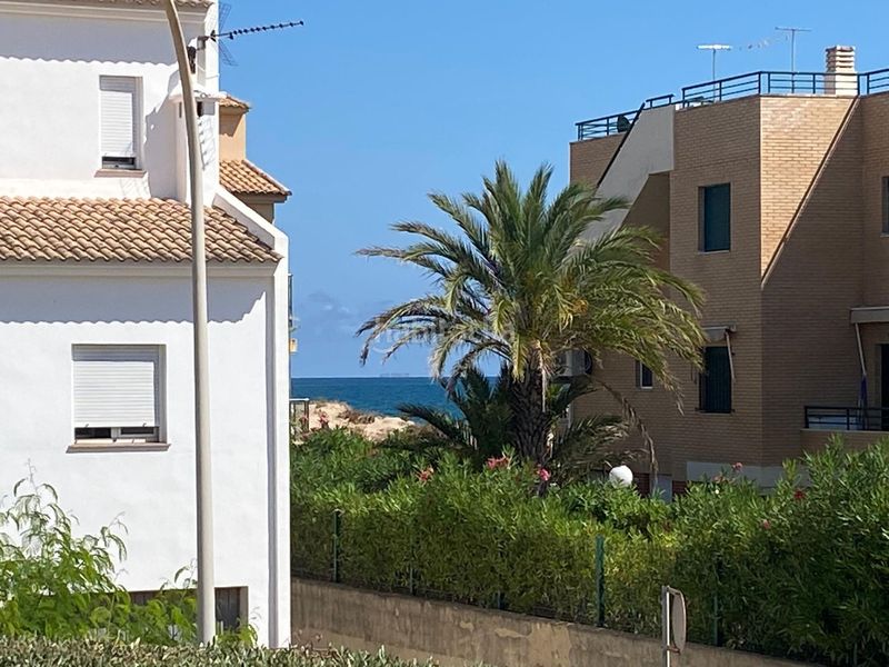 Foto d75bed2a-de1c-4bec-91c7-f90894d1ca4f. Casa adossada amb calefacció piscina a Oliva nova Oliva