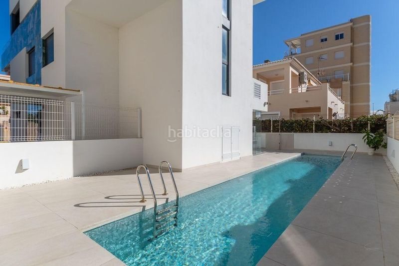 Foto 414c0962-a18c-4a8d-8f39-359d87f44447. Àtic amb calefacció aparcament piscina a Oliva playa Oliva