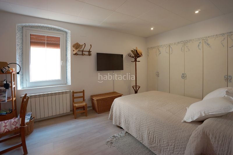 Foto ce9848cd-33f7-4405-90dd-0b12cb84edfb. Casa con camino riscaldamento in Eixample Sant Feliu de Guíxols