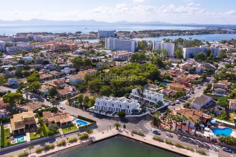 Foto d24ffb8a-ffaa-4ae2-99d5-d97665929a7d. Casa a schiera con piscina in port d´Alcúdia-platja dálcúdia Alcúdia