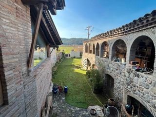 Masia a Bescanó. Casa rústica barri raval