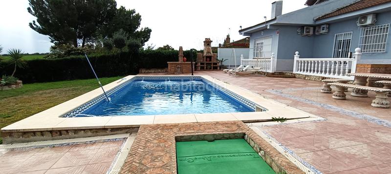 Foto 32674642-bf5e-49ad-8da3-6687f6d812a1. Chalet avec parking piscine dans Espartinas pueblo Espartinas