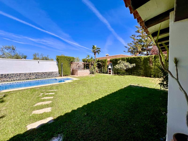 Foto 3166d1c1-f07e-49fa-bf4c-240d40752323. Chalet avec cheminée piscine dans ramal de Espartinas Espartinas