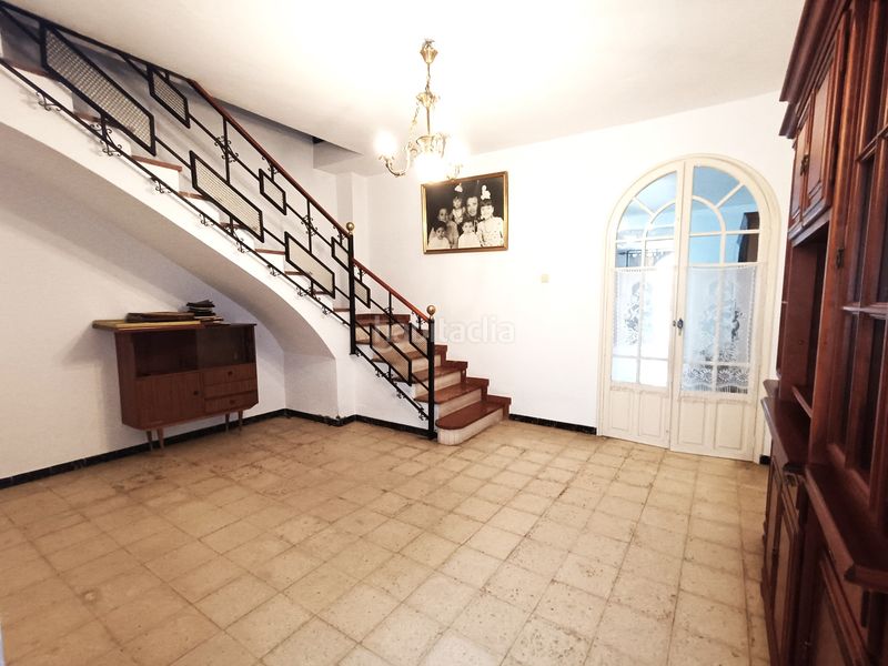 Foto 0ad12b57-0c98-4dc6-8340-b353824a6c2c. Casa adossada amb xemeneia aparcament a Olivares