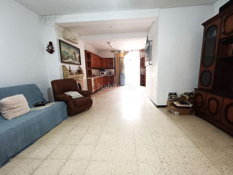 Foto ab04ac5b-ee90-43ce-89cb-85e02535ff1c. Casa adossada amb xemeneia aparcament a Olivares