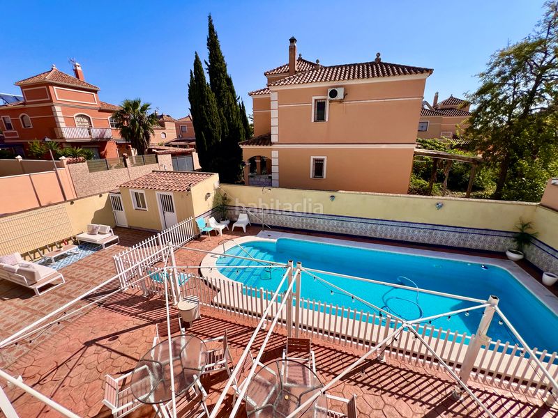 Foto 9f62bd88-bbb0-4bb6-93f8-4e7bbb1f09f3. Xalet amb xemeneia aparcament piscina a Espartinas pueblo Espartinas