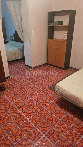 Foto 388c7d61-0a81-42db-aa11-2e59941d8cd4. Casa adossada a Albuixarres Alzira