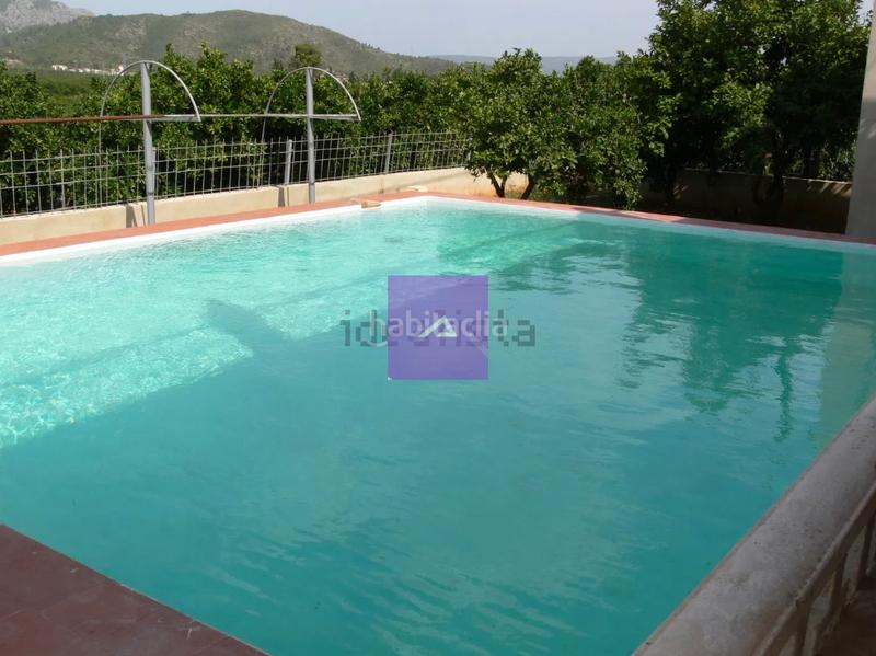 Foto bc374c9c-10cb-4ca0-9947-220b79c70099. Chalet mit parking in Alquenència - Venècia Alzira