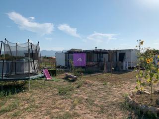 Masia  Calle entrada del rellotge. Mobil-home en cullera