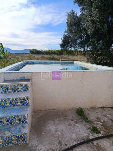 Foto 75e6306f-fa4c-425f-b054-0d7681561674. Rural plot in Sueca Sueca