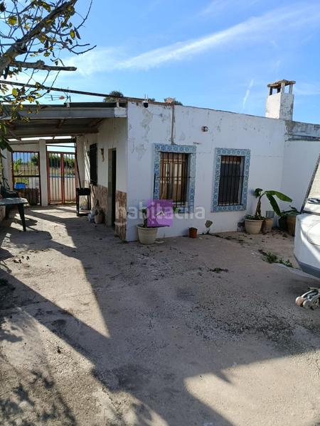 Foto db2508da-4039-4c28-910c-a451a2492fb3. Rural plot in Sueca Sueca
