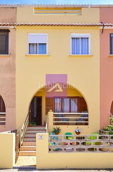 Foto a78857f9-599f-4271-94f2-f56ef9d69723. Casa adossada amb aparcament a Mareny de Barraquetes Sueca