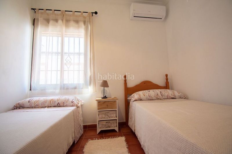 Foto c5b8653d-c35f-46e1-9134-e7b876639dbd. Casa adossada amb piscina a Arriate