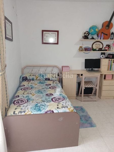 Foto 5022a8e5-9619-4ab1-860e-24854a0bd46b. Casa adossada a Centro Antequera