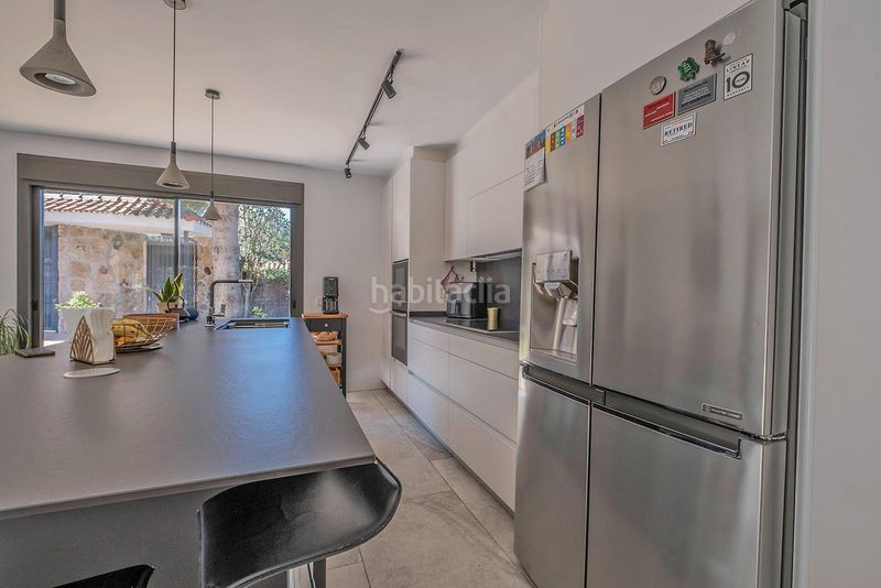 Foto 47f19b3e-6ce9-4a5a-b330-226d9f671e6f. Maison jumelée avec parking dans Urbanización Este-Montepríncipe Boadilla del Monte