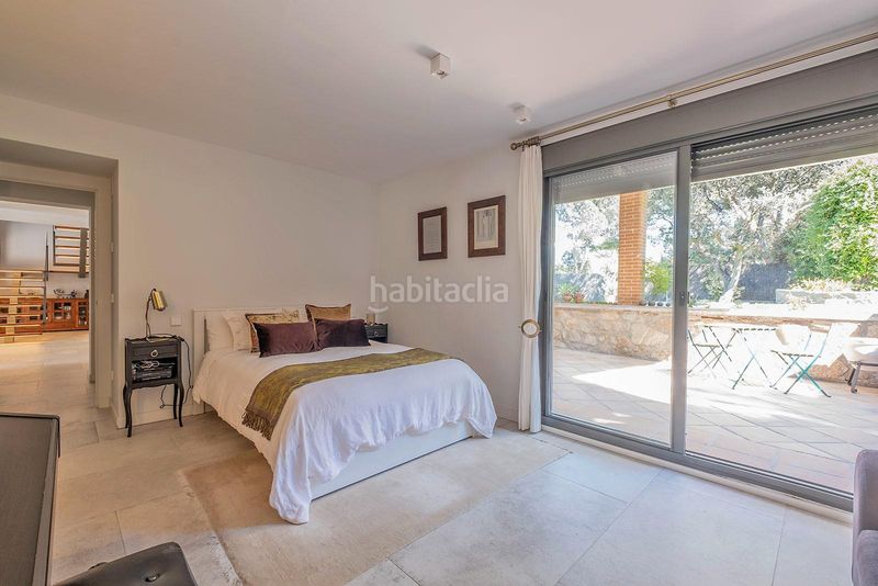 Foto 58475a9c-2f7a-4ed8-b17f-5d5282888259. Maison jumelée avec parking dans Urbanización Este-Montepríncipe Boadilla del Monte