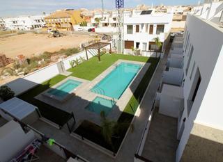 Dúplex a Pilar de la Horadada Ciudad. Obra nueva  dúplex con 3 dormitorios, garaje y piscina comunitar