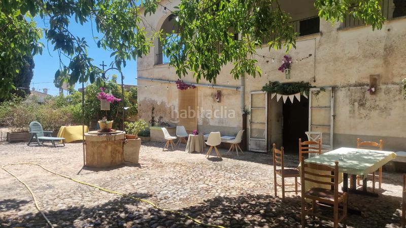Foto 2a8089fa-399a-4f34-bda3-782d1ac04b13. Masia amb xemeneia aparcament a Sa Cabana - Can Carbonell - Ses Cases Noves Marratxí
