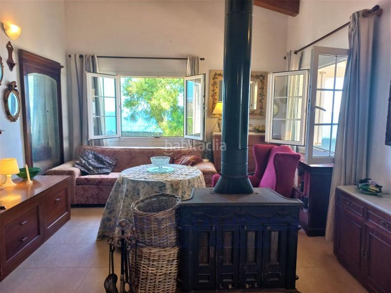 Foto c724a271-725d-48a5-b880-323b6cd5e435. Casa chalet con licencia turística en primera línea de mar en Sant Lluís